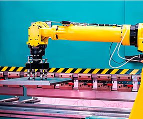 Image showing a robotic arm in a production line