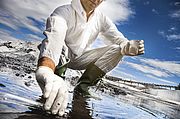 Image showing Scientist analysing the water of a river