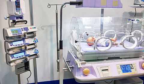 Incubator for newborns and syringe infusion pumps in clinic