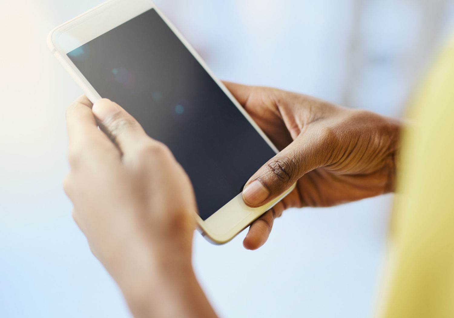 Image showing a pair of women's hands holding a smart phone