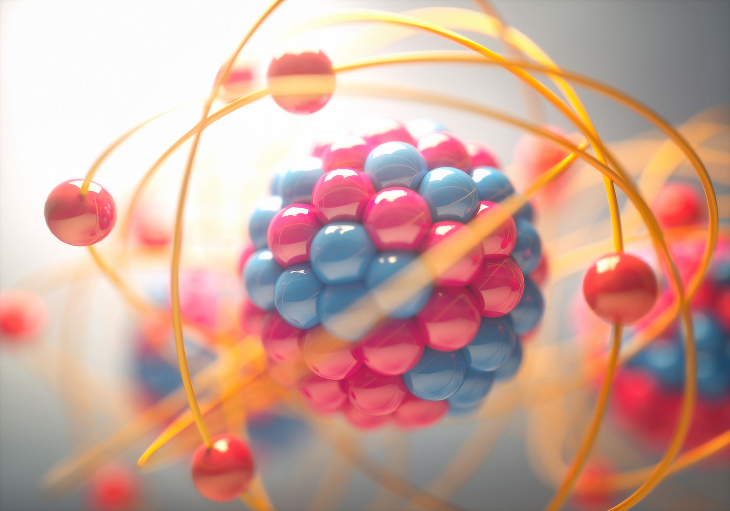 image of a model of an atom nucleus surrounded by an electron shell