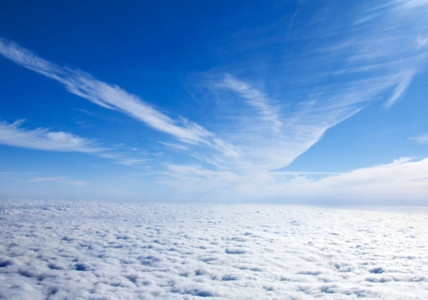 Image showing the view of clouds through the potral of a plane