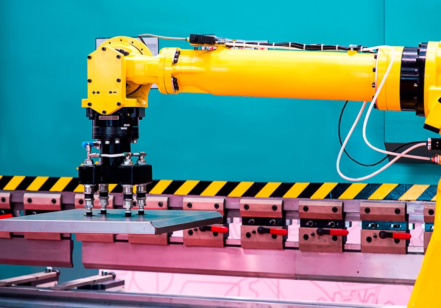 Image showing a robotic arm in a production line