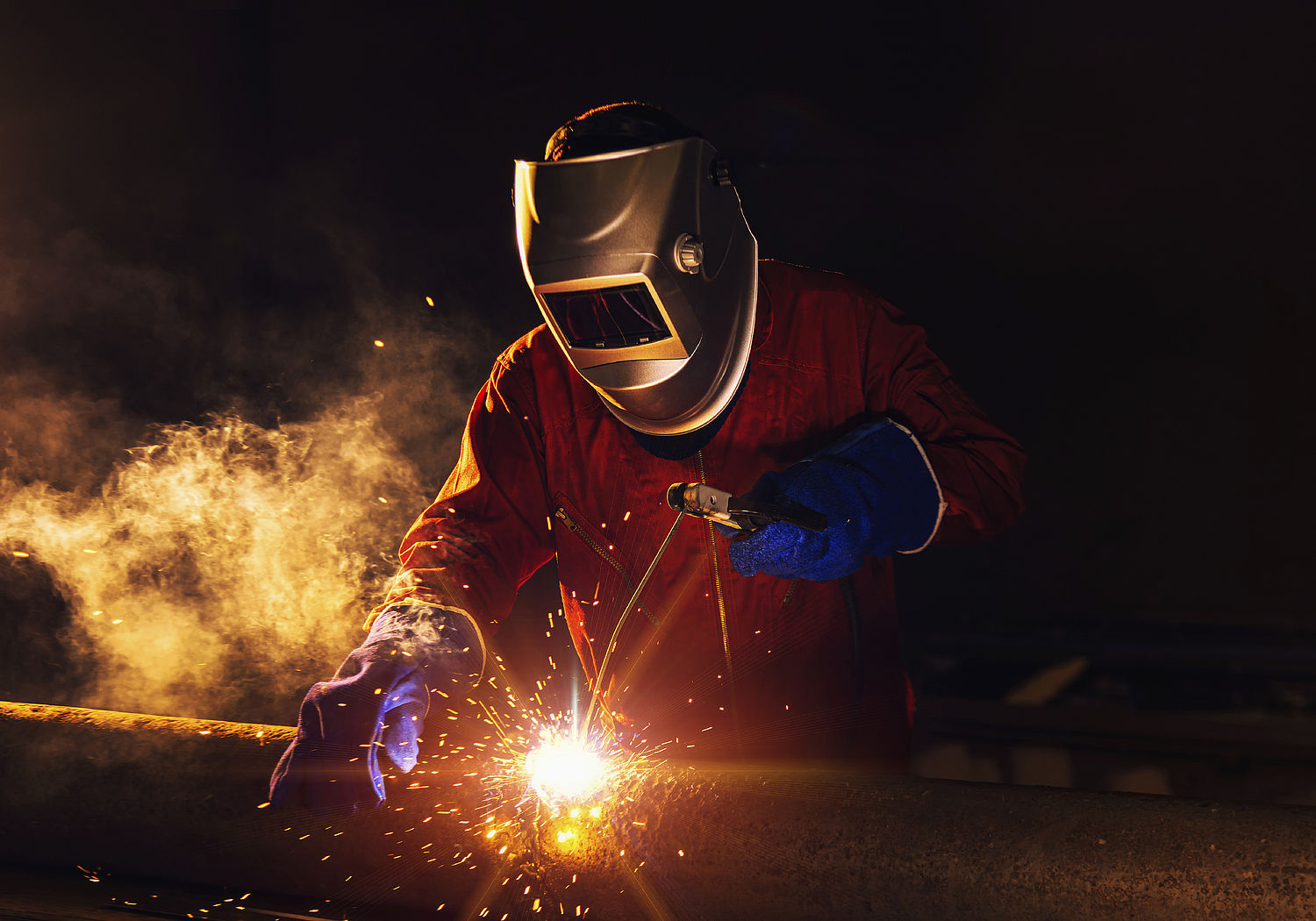 Image showing a worker in a steel factory