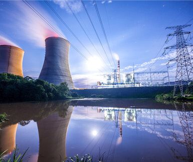 Image showing a power plant on the banks of a river