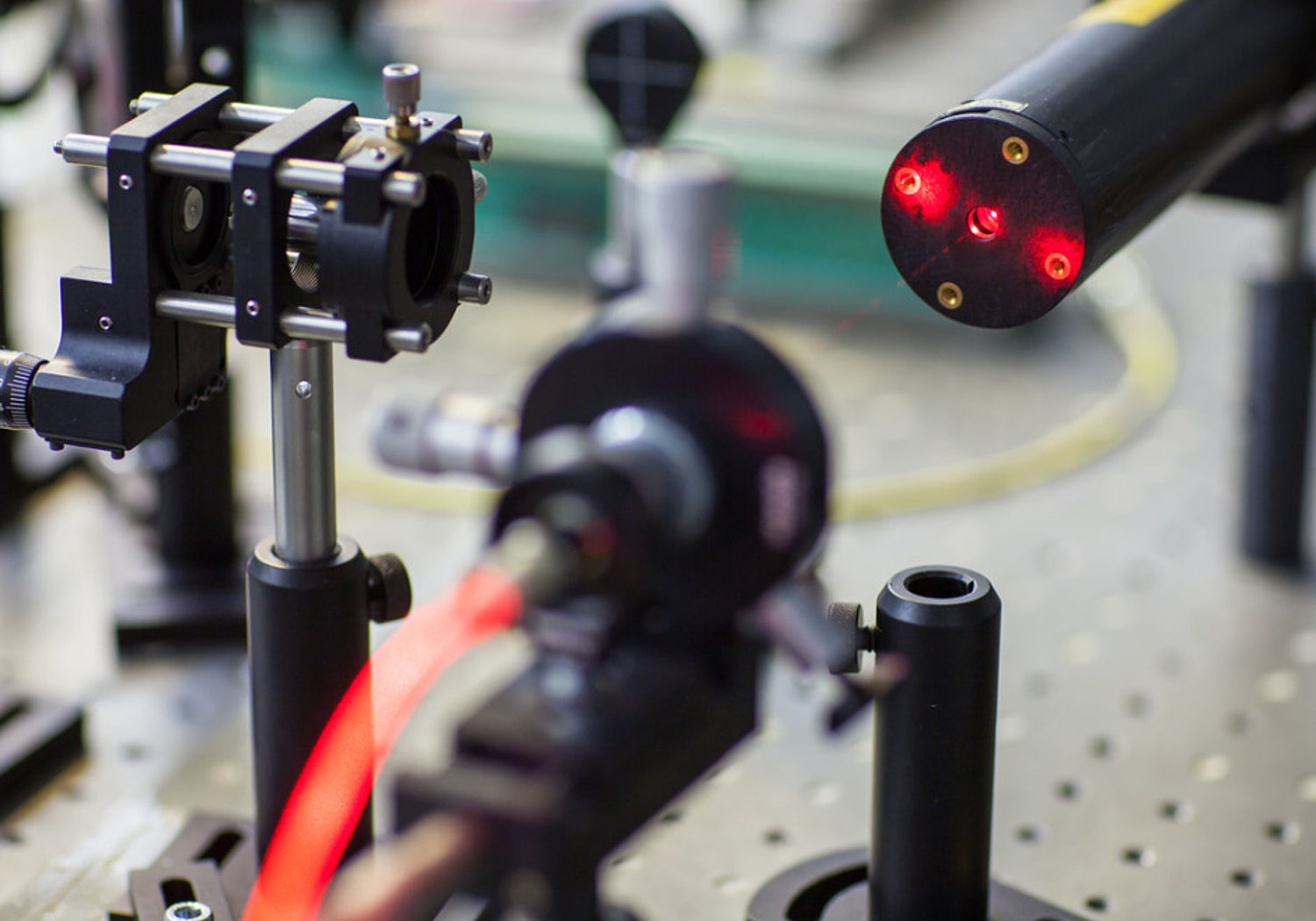 Image of a Laser on bench in quantum laboratory