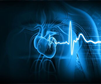 Image showing an artist’s impression of a beating heart. Against a dark background a heart beats inside a human body giving off a pulse of electricity.