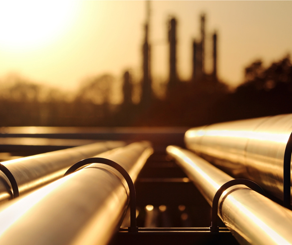 Golden sunset in crude oil refinery with pipeline system picture id649955168