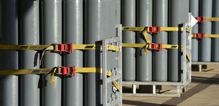 Image showing Groups of large Nitrogen gas bottles on stands 