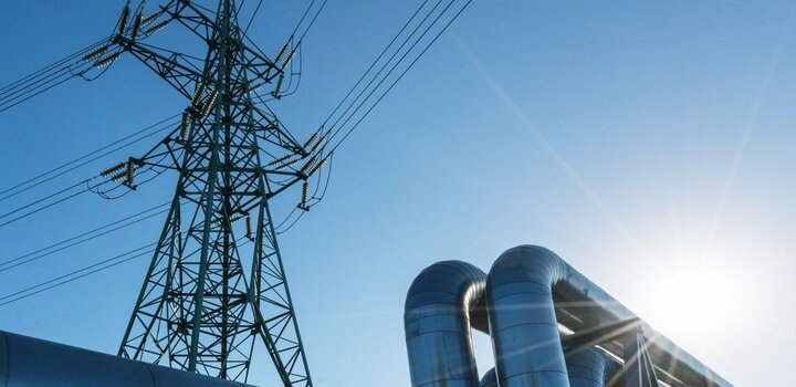 Image showing Industrial pipelines on pipe-bridge against blue sky