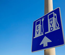 Image showing a sign for an Electric vehicle and hydrogen refueling station