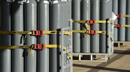 Image showing Groups of large Nitrogen gas bottles on stands 