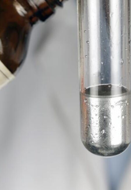 Image showing mercury metal being poured into a test tube