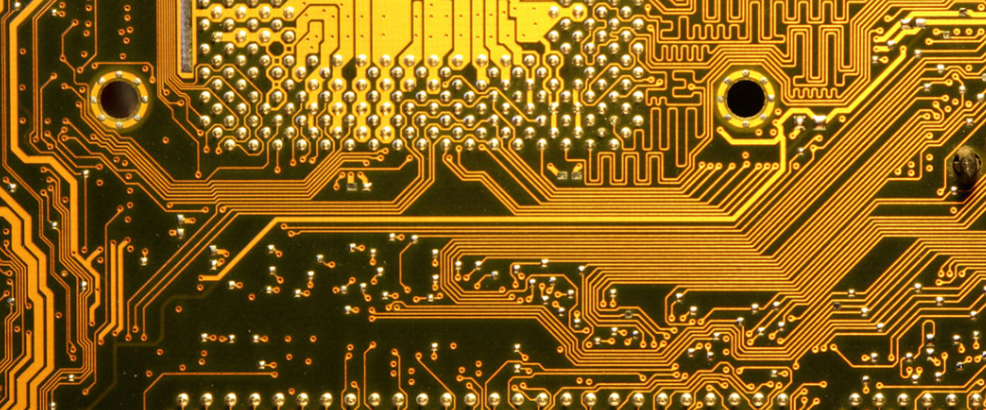 Electronic circuit board closeup with golden connections picture id139665530