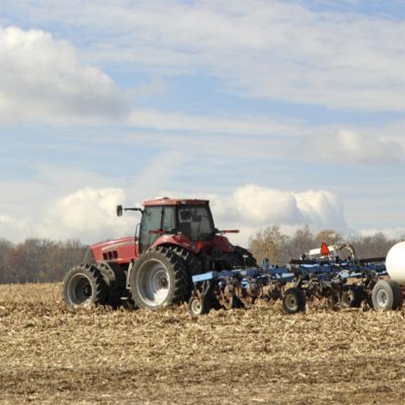 Measuring ammonia in air Image showing a tractor plowing and fertilising a field