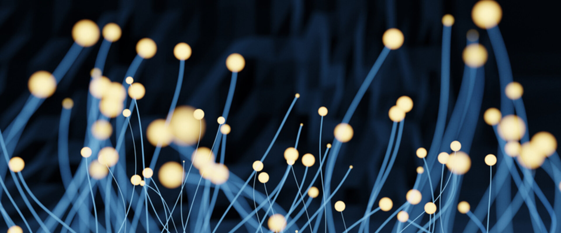 Schematic representation of piezoelectric nanowires Against a black background in the foreground is a “forest” of pale blue nanowires with glowing tips