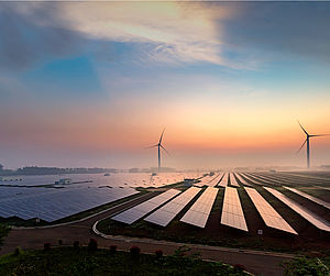 Sunrise at a solar power plant Image showing sunrise at a solar power plant